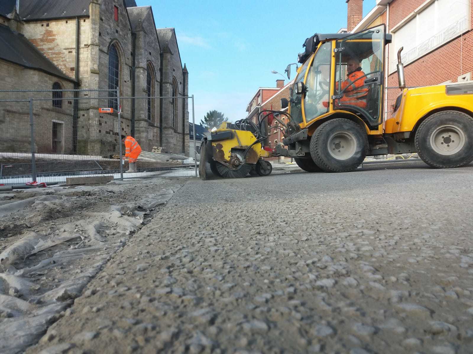 Uitwassen betonverharding in Wemmel